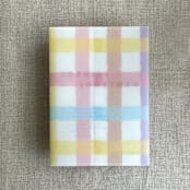 "Marshmallow checkers printed vellum wrap for 5x7 card | pack of 10" - Invitation Jackets and Overlays in multicolorassorted-colors by Ivory Invitations