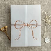 "Ginger ribbon bow printed vellum wrap for 5x7 card | pack of 10" - Invitation Jackets and Overlays in orange by Ivory Invitations