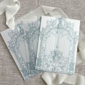 "Dusty blue ornamental gate vellum jacket for invitations | Set of 10" - Invitation Jackets and Overlays in blue by Maria Ferrer G.
