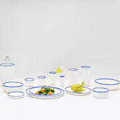 "Ligne Tall Cup White With Cobalt Blue Rim" - Glassware in multicolor by Tina Frey