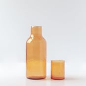 "Carafe Set - Amber" - Glassware in orange by Powered By People
