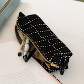 "Small Grid-Stitch Toiletry Bag - Charcoal" - Makeup Bag in black by Anchal