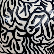 "stoneware vase with black and white maze pattern" - Vases in black by Liz Vigoda