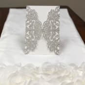 "Qty of 50 Custom Silver Glitter Exquisite Lace Laser Cut | Other Color Options Available" - Invitation Pockets in brown by Papel Custom Design