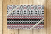 "ugly sweater" - Wrapping Paper in Merry Red by JaxRobyn - Front