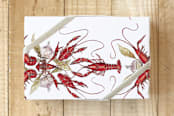 "Crawfish Boil" - Wrapping Paper in boil red by Annie Moran - Front