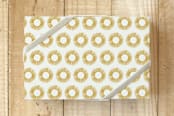 "Organic Sunburst" - Wrapping Paper in Gold by Stacey Hill - Front