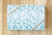 "Stars Galore" - Wrapping Paper in Turquoise Ombre by Jessica Druxman - Front