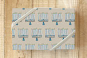 "Rustic Menorah" - Wrapping Paper in Dusty Blue by Lisa Travis - Front