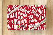 "LY Christmas Wishes" - Wrapping Paper in Red by Lyna Ti - Front