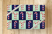 "Candy Canes and Snowflakes" - Wrapping Paper in Festive Red by Lisa Travis - Front