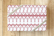 "Swedish Christmas Criss Cross" - Wrapping Paper in Christmas Red by Simi Gauba - Front