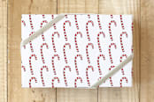 "Dandy Candy Canes" - Wrapping Paper in Scarlet by Lisa Travis - Front