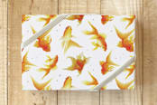 "it’s raining goldfish" - Wrapping Paper in carrot peel by Deborah Chou - Front