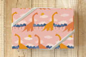 "Brachiosaurus March" - Wrapping Paper in Cretaceous Pink by Charla Pettingill - Front