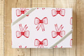"Put a Bow on It " - Wrapping Paper in pink and red by Bridget Kirsten Camden - Front