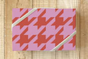 "Houndstooth" - Wrapping Paper in Pomegranate by Gina Giselle - Front