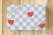 "Checkered Hearts Gift Wrap" - Wrapping Paper in Cherry by Amber Barkley - Front