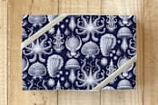 "Strange Mollusks" - Wrapping Paper in Navy Blue by Blixa 6 Studios - Front