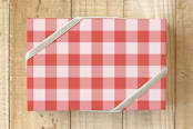"Festive Red Vichy" - Wrapping Paper in festive red by Emanuela Carratoni - Front