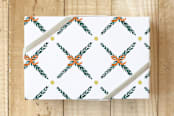 "Holiday Bow Trellis" - Wrapping Paper in Citrus by Jenny Batt - Front