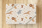 "Baby Safari Animals" - Wrapping Paper in Cream by Christy Hy Lee - Front