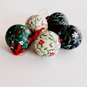 "Hand-Painted Botanical Christmas Ornaments on off white Background – Set of 2" - Ornaments in red by Arohika Verma
