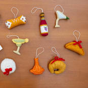 "Felt Croissant" - Ornaments in beige by Global Goods Partners
