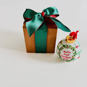"Personalized Hand-Painted “Baby’s First Christmas” Ornament – Red and Green Holiday Design" - Ornaments in green by Arohika Verma