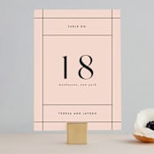 "The Grid" - Table Numbers in Rosebud by Mansi Verma - Front