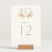 "Roses Crest" - Table Numbers in Pomegranate by Everett Paper Goods - Displayed (stand not included)