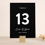 "In this together" - Table Numbers in Black Tie by Lea Delaveris - Front