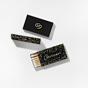 "Cancer Matchboxes, Black and Gold, Pack of 4" - Matchbooks and Matches in natural by ForYourParty