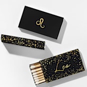 "Leo Matchboxes, Black and Gold, Pack of 4" - Matchbooks and Matches in natural by ForYourParty