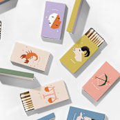 "Color Pop Zodiac Matchboxes, Pack of 12" - Matchbooks and Matches in natural by ForYourParty