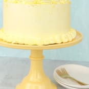 "Daisy Yellow Melamine Cake Stand- Large" - Cake Stands in black by Joyeux Company