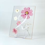 "Gold-Lined Pressed Flower Table Number, Pink" - Table Numbers in pink by Jasmine Jhunjhnuwala