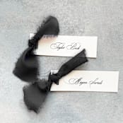 "Slim Place Cards With Black Bow | Set Of 10 | Custom Text" - Place and Escort Cards in black by Cotton and Bow