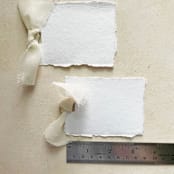 "Handmade Paper Place Cards with Ivory Bow | Set of 10 | Custom Text" - Place and Escort Cards in white by Cotton and Bow