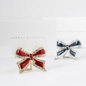 "Enamel bow placecard holders, red, set of four" - Place Card Holders in red by Joanna Buchanan