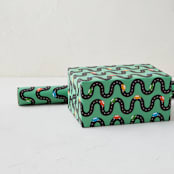 "Little Racer" - Wrapping Paper Roll in Grass by Jennifer Lew