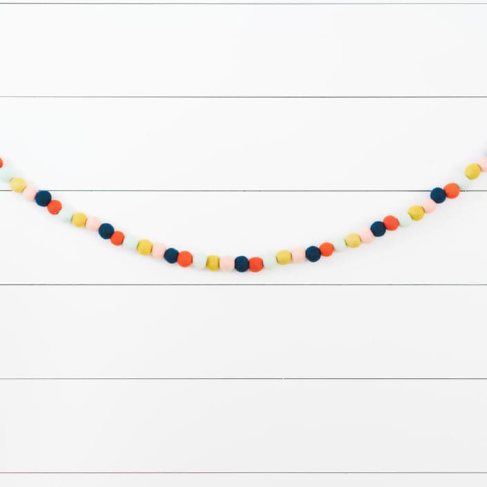 "Ticker Tape Felt Ball Garland" - Garlands in multicolor by aubry bennion