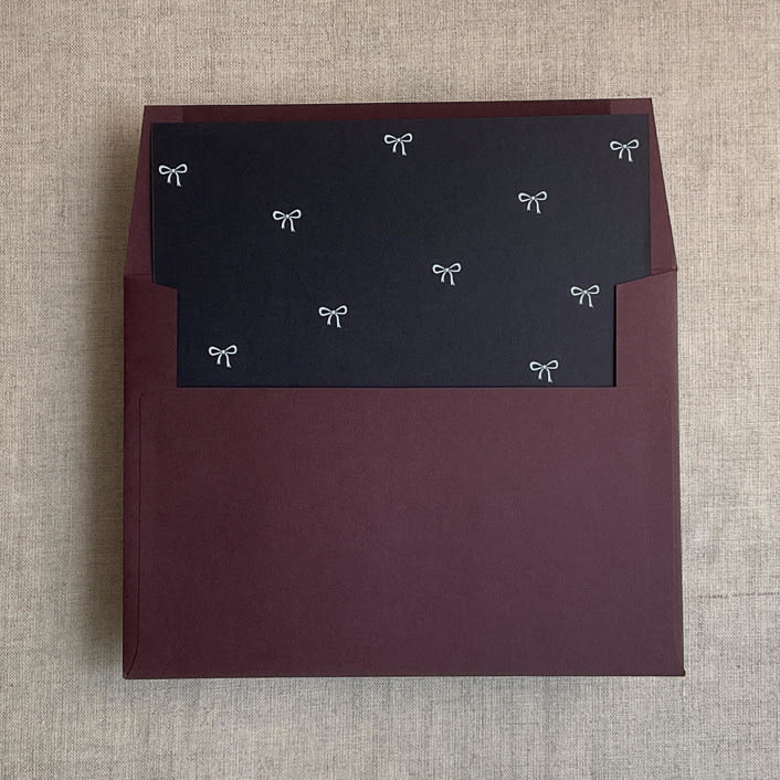 "Black baby ribbon bows envelope liner for A7 square envelope | pack of 10" - Envelope Liners in black by Ivory Invitations
