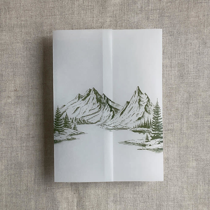 "Green mountain sketch printed vellum wrap for 5x7 card | pack of 10" - Invitation Jackets and Overlays in green by Ivory Invitations