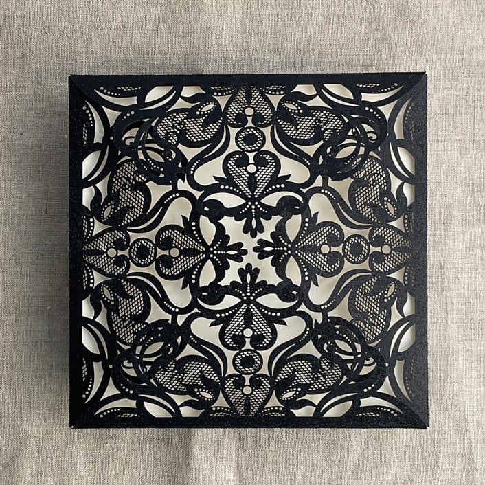 "Black glitter lace laser cut square petal fold | pack of 10" - Invitation Pockets in black by Ivory Invitations