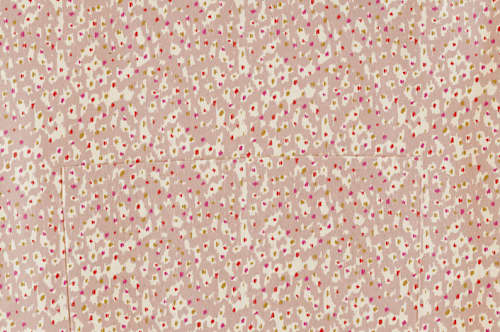 This is a tan aprons by Michelle Fifis called animal dots in standard