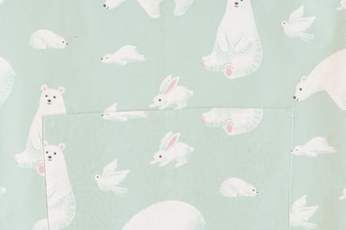 This is a azure aprons by Shannon Chen of Four Wet Feet Studio called polar bears in standard