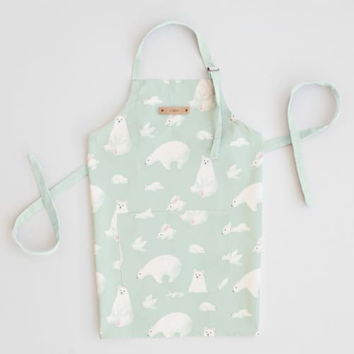 This is a azure aprons by Shannon Chen of Four Wet Feet Studio called polar bears in standard