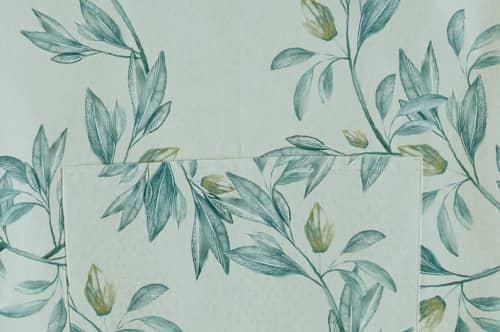 This is a greenery aprons by Lucrecia Caporale called botanical greenery in standard