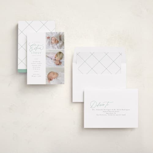 This is a mint babys first christmas with standard by Everett Paper Goods called extra cheer here printing on recycled smooth signature in standard